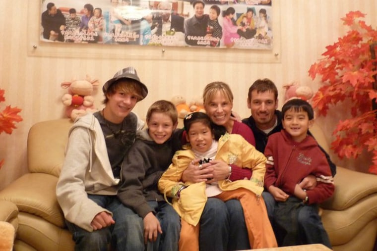 The Cunningham family on the day that daughter Cate was adopted from China.