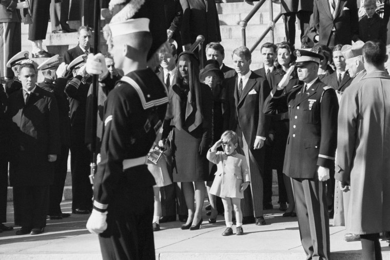 John F. Kennedy Jr., 3, salutes as the casket of his father, the late President John F. Kennedy, is carried from St. Matthew's Cathedral in Washington, D.C., on Nov. 25, 1963.