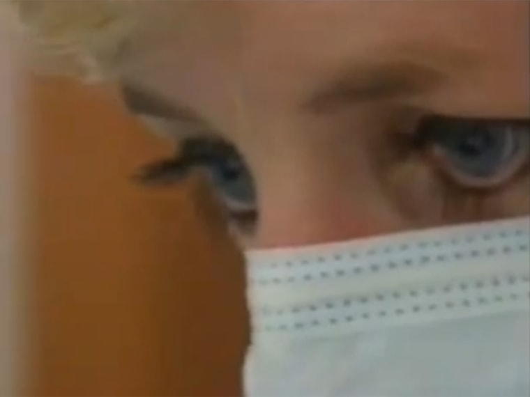 Princess Diana observing a surgery.