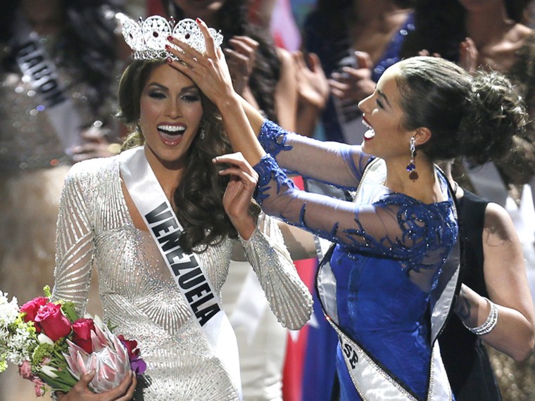 Miss Universe 2012 Olivia Culpo, from the United States, right, places the crown on Miss Venezuela Gabriela Isler during the 2013 Miss Universe pagean...