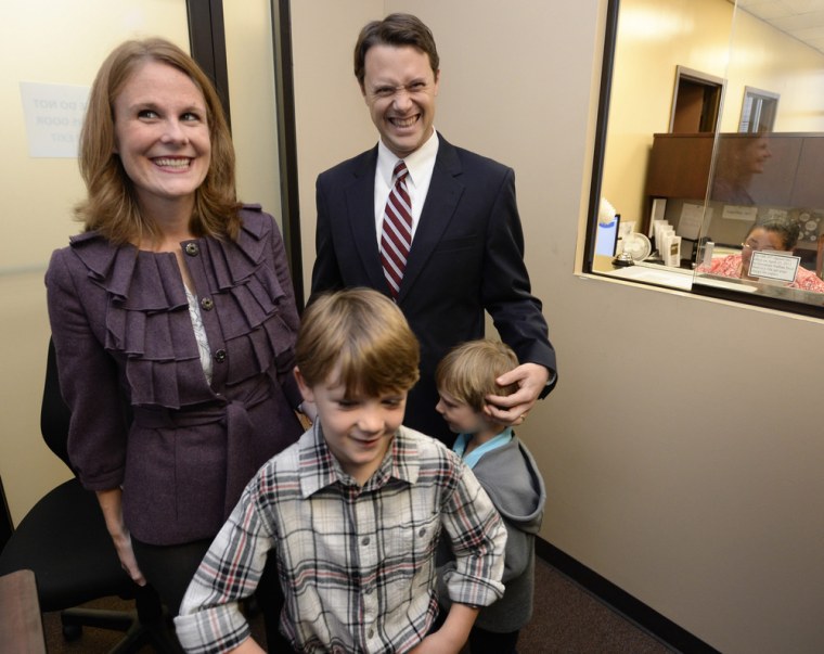 Jason Carter with his wife and sons after filing paperwork to run for Georgia governor on Nov. 7, 2013.