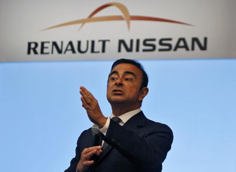 Carlos Ghosn, chairman and CEO of the Renault-Nissan Alliance, gestures as he speaks at a news conference in the southern Indian city of Chennai July 16, 2013.