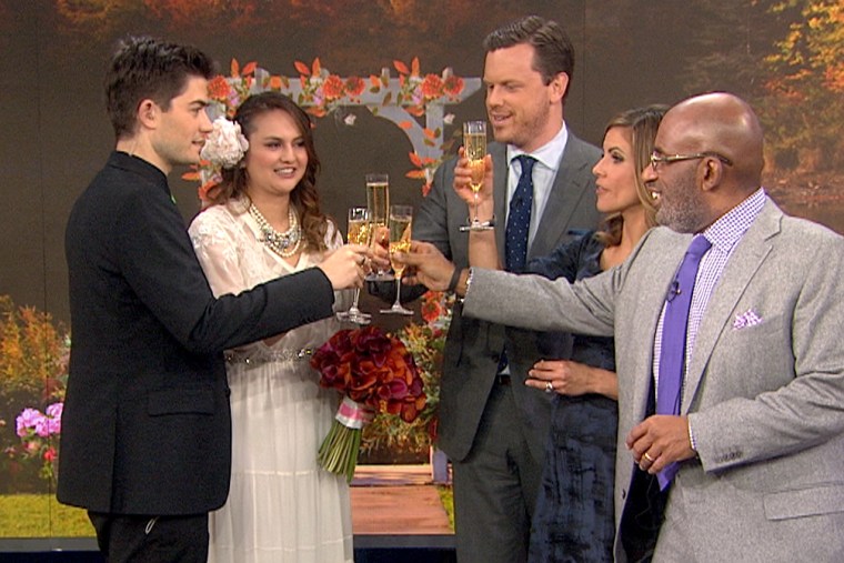 The newlyweds and their TODAY wedding guests toast to their lucky day.