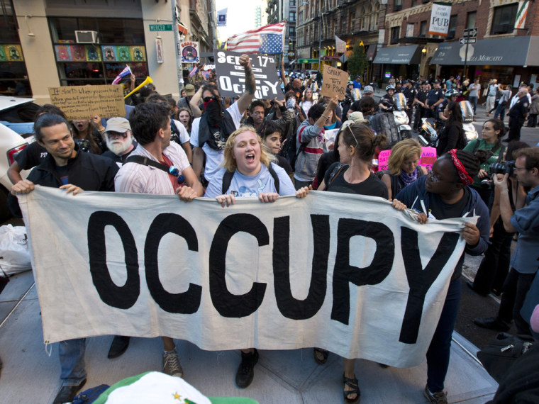In this September 2012 photo, Occupy Wall Street protesters make their way to Broadway at the start of their Saturday march to Zuccotti Park, the first planned march as part of three days of events to mark the one-year anniversary of the movement.Occupy Wall Street took center stage last fall, galvanizing thousands of people across the country to heed the call,