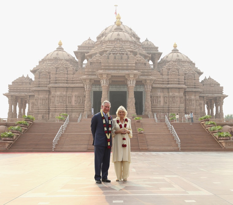 DELHI, INDIA - NOVEMBER 08:  Camilla, Duchess of Cornwall and Prince Charles, Prince of Wales pose outside the Akshardham Temple during day 3 of an of...