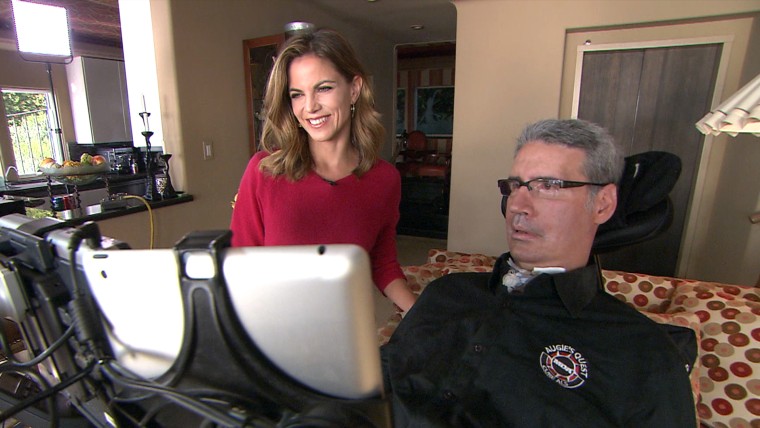 Augie and Natalie Morales, who says he is thriving, \"miraculously.\"