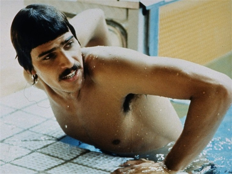 ** FILE ** In this August 1972 file photo, United States' Mark Spitz at the Olympic Pool in Munich, West Germany. Michael Phelps, also of the U.S., be...