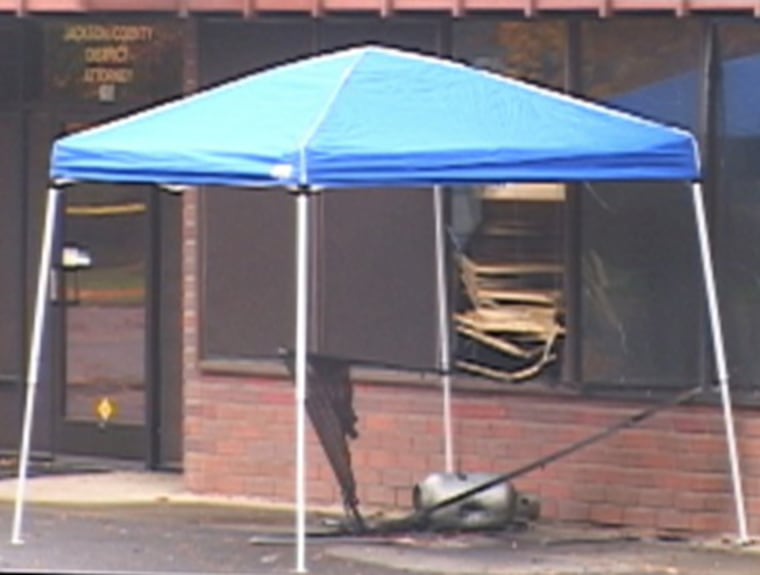 Authorities found a propane bomb outside the Jackson County prosecutor's office in Medford, Ore.
