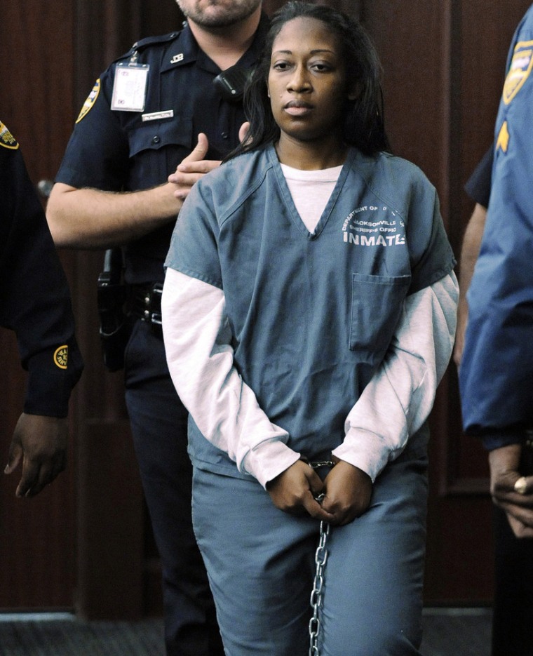 Marissa Alexander enters the courtroom for her bond hearing on Wednesday, Nov. 13, 2013, in Jacksonville, Fla.