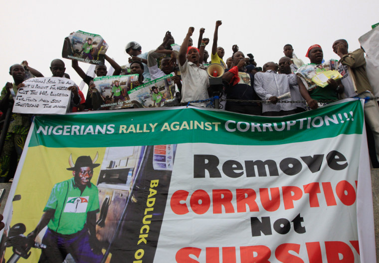 Nigerians angered by soaring fuel prices and decades of ingrained government corruption protest following the removal of fuel subsidy by the government in Lagos in January.