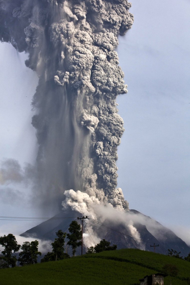 Indonesia's Mount Sinabung volcano spews pyroclastic smoke in Medan, Sumatra, on Nov. 14, 2013.
