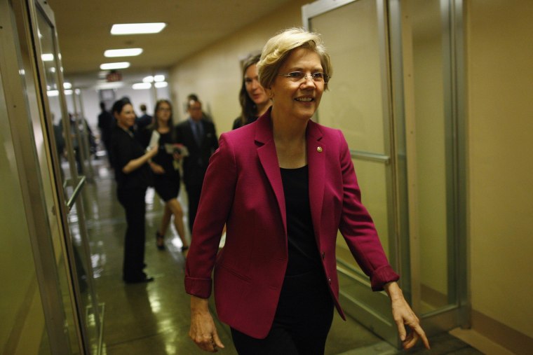 U.S. Senator Elizabeth Warren departs after the Senate passed a spending bill to avoid a government shutdown, sending the issue back to the House of Representatives, at the U.S. Capitol in Washington, September 27, 2013.
