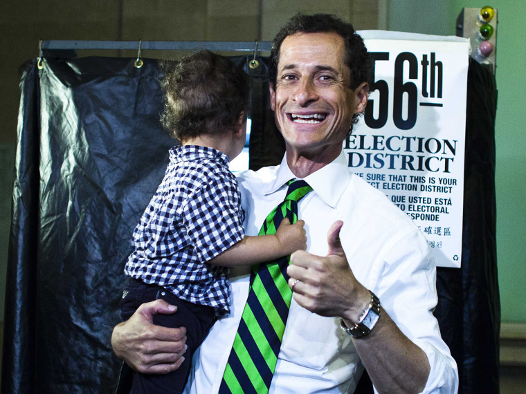 Anthony Weiner, exiting the voting booth with his son, Jordan, on primary day. Voters gave him a thumbs down.