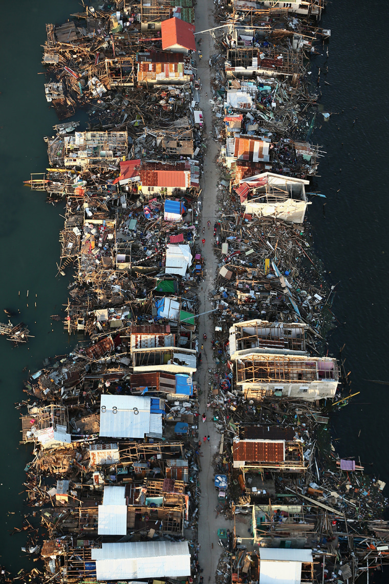 An aerial view of a demolished coastal town on Eastern Samar Island on November 14, 2013 in Leyte, Philippines. Typhoon Haiyan which ripped through Philippines has been described as one of the most powerful typhoons ever to hit land, leaving thousands dead and hundreds of thousands homeless.