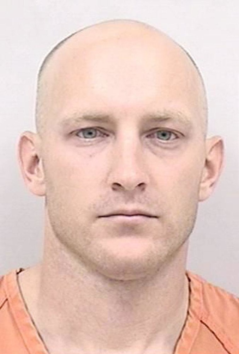 This booking photo released by the Colorado Springs Police Department shows Army 1st Lt. Aaron G. Lucas, of Alabama. The Army says Lucas, who is being held in the El Paso County jail in Colorado Springs, Colo. on 21 counts including sexual assault on a child, enticement and indecent exposure, was previously awarded medals including the Bronze Star.