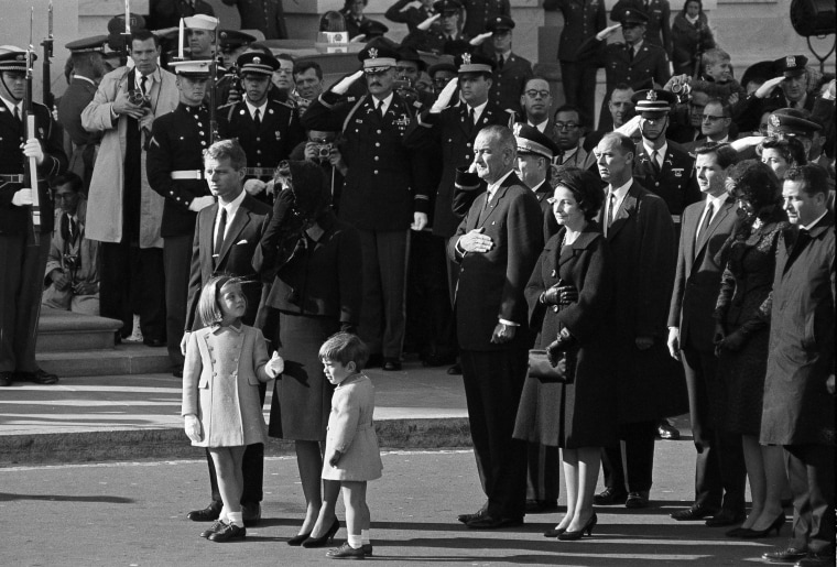 Jacqueline Kennedy, her children Caroline and John Jr., and Attorney General Robert F. Kennedy arrive at the Capitol in Washington, Nov. 24, 1963. They rode from the White House in a procession carrying the slain president's body to the Capitol. Behind them are President Lyndon B. Johnson and his wife Lady Bird Johnson.