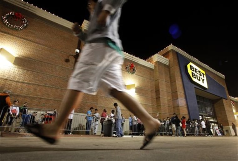 Best Buy is cutting prices and opening on Thanksgiving in the fierce competition for shoppers' holiday dollars.