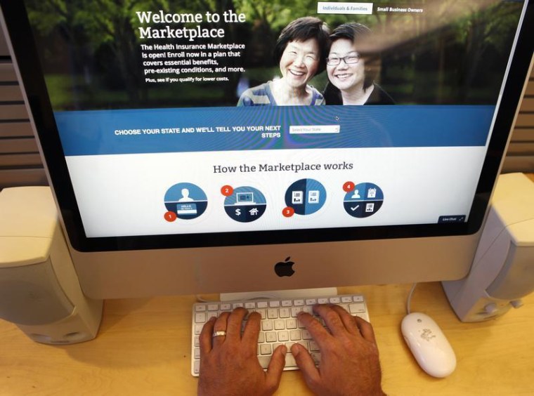 A man looks over the Affordable Care Act (commonly known as Obamacare) signup page on the HealthCare.gov website.