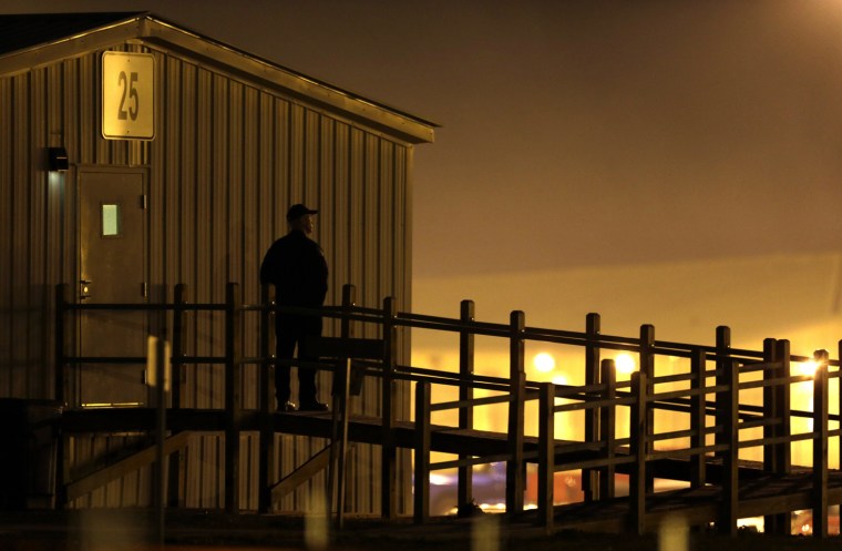 A guard stands outside a perimeter building at the Eastern Reception, Diagnostic & Correctional Center in in Bonne Terre, Mo., before the scheduled execution of Missouri death row inmate Joseph Paul Franklin on Wednesday.