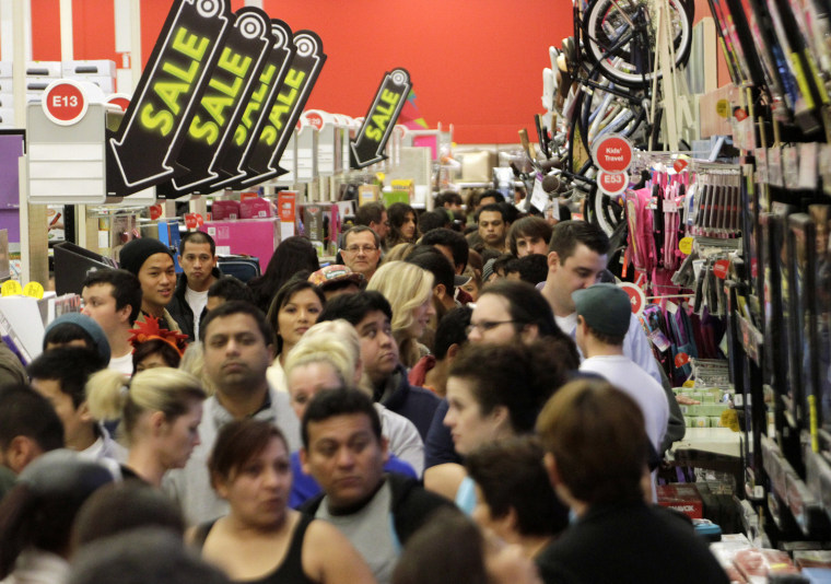 A crowd of shoppers browse at Target on the Thanksgiving Day holiday in Burbank, California November 22, 2012. The shopping frenzy known as \"Black Fri...
