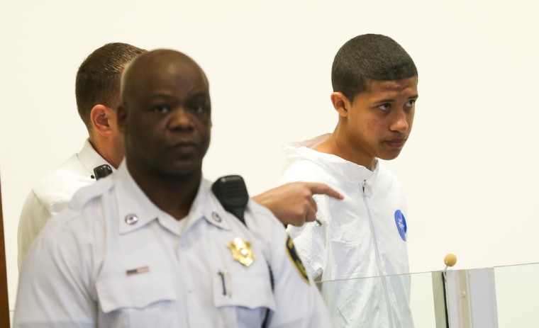 Philip Chism, 14, who is charged as an adult in the murder of Danvers High School teacher Colleen Ritzer is seen during his arraignment in Salem District Court on Oct. 26.