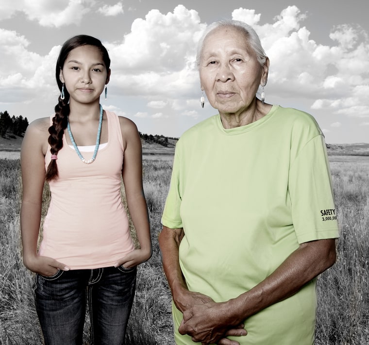 Jenni Parker, right, and granddaughter Sharlyse Parker of the Northern Cheyenne tribe pose in Lame Deer, Mont., in August 2013.