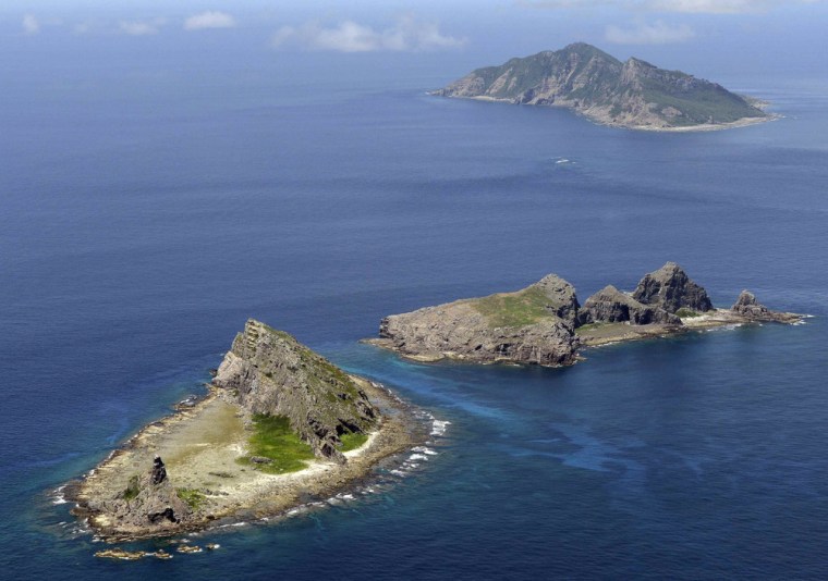 A group of disputed islands, known as Senkaku in Japan and Diaoyu in China, is seen in the East China Sea. Japan and the United States sharply criticized China's move to impose new rules on airspace over islands at the heart of a territorial dispute with Tokyo.