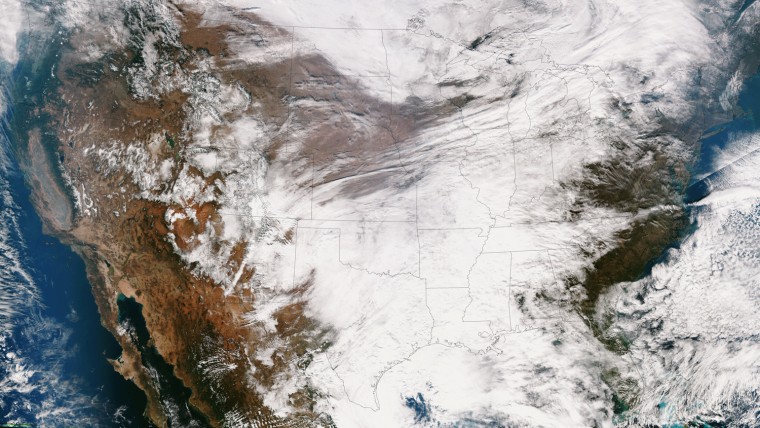 This true color image of the Continental U.S. taken Nov. 25 by the Suomi NPP satellite and shows the system as it moves through the South and Midwest.
