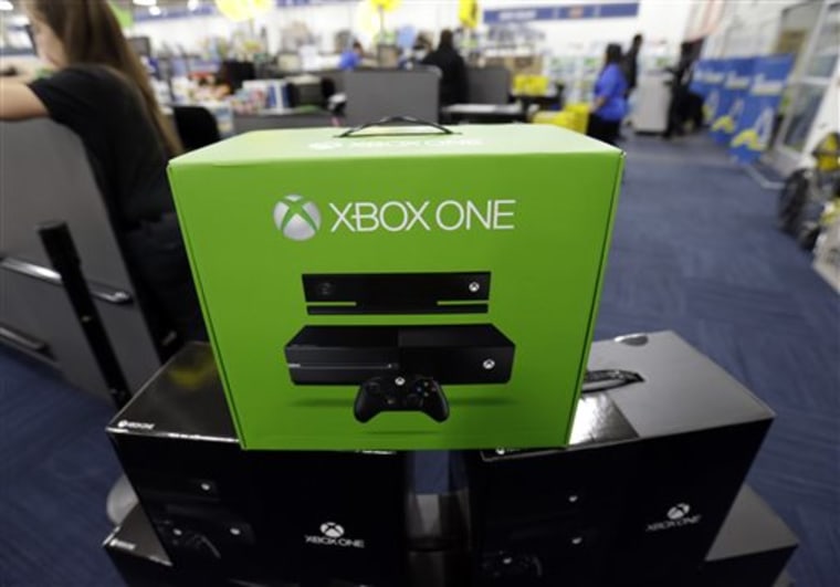 FILE - In this Friday, Nov. 22, 2013 file photo, The Xbox One is on display at a Best Buy store in Evanston, Ill. There's a couple of new foes affect...