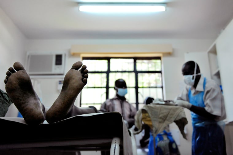 A man waits to undergo a circumcison procedure at a donor-funded clinic in Kisumu, Kenya.