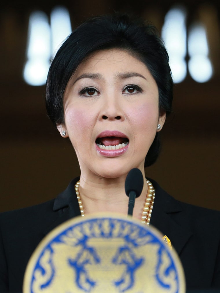 Embattled Thai Prime Minister Yingluck Shinawatra begged protesters who have staged the most sustained street rallies in Bangkok in years to call off their demonstrations Thursday and negotiate an end to the crisis.
