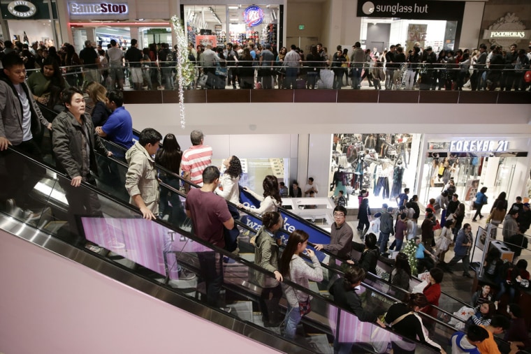 Shoppers throng Brea Mall during Black Friday shopping on Friday, Nov. 29, 2013, in Brea, Calif.