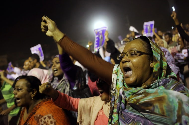 Sudanese anti-government protesters chant slogans during a demonstration in Khartoum, Sudan, on Sunday.