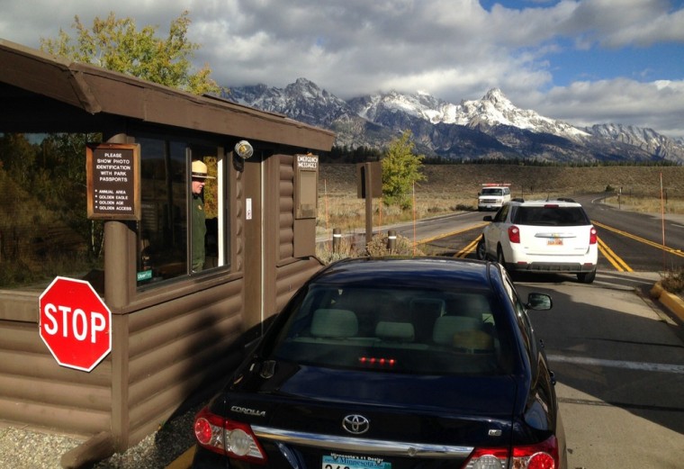 Christine Palka, a park ranger at Grand Teton National Park, turns away visitors in Moose, Wy. on Oct. 1, following the government shutdown.