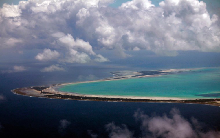 North and South Tarawa are seen from the air in the central Pacific Island nation of Kiribati May 23, 2013. Kiribati consists of a chain of 33 atolls and islands that stand just a few feet above sea level, spread over a huge expanse of otherwise empty ocean.