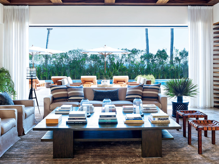 This is the living room in George Clooney's villa, which has a different vibe in the interior than the adjoining one owned by Cindy Crawford and her husband.