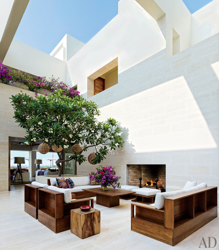 Both homes feature open-air atriums. Here is a look at the courtyard in the home of Cindy Crawford and husband Rande Gerber.