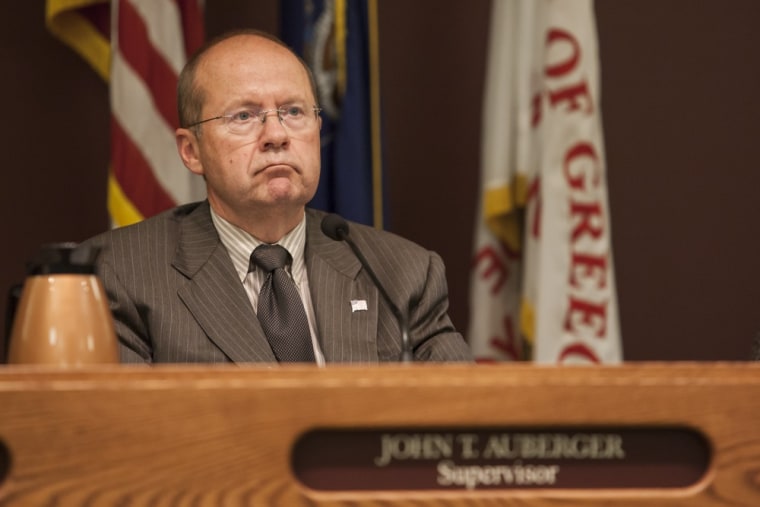 Town supervisor John Auberger sits during a board meeting at the Town Hall in Greece, N.Y., on Aug. 20, 2013. The Supreme Court soon will take up the case of the Town of Greece v. Galloway, concerning use of public prayers before town meetings and whether it violates the Constitution.