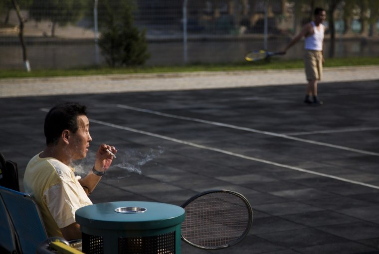Men play tennis at a newly built recreational park in Pyongyang. North Korean authorities have been encouraging a broader interest in sports in the country, both at the elite and recreational levels, as a means of energizing and mobilizing the masses.