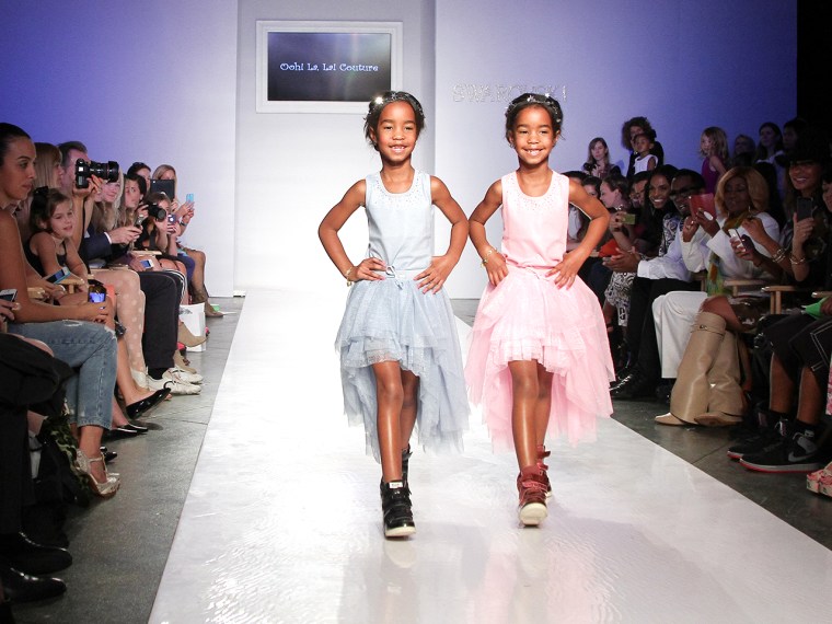 NEW YORK, NY - OCTOBER 05: Jesse Combs and D'Lila Combs walk the Ooh! La La! preview during the Swarovski at petiteParade NY Kids Fashion Week in Coll...