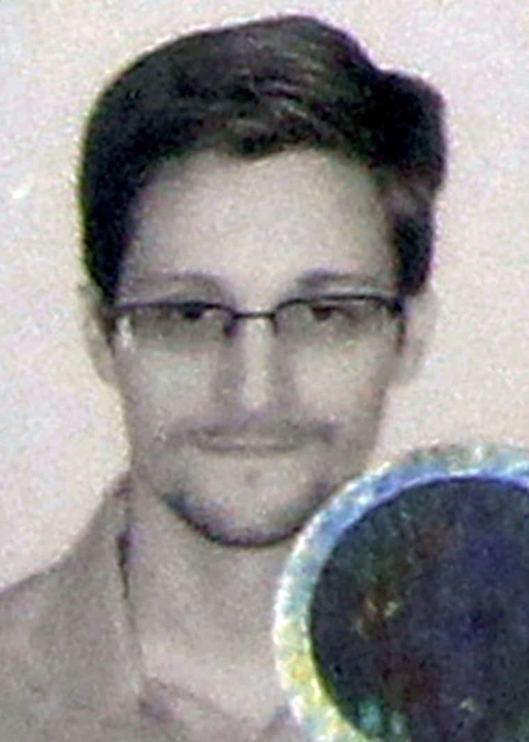 Fugitive former U.S. spy agency contractor Edward Snowden's photograph on his new refugee documents granted by Russia.