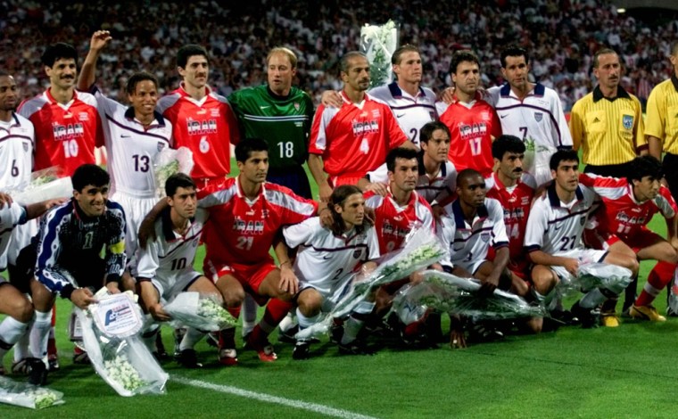 American and Iranian team players pose before their historic game at the 1998 World Cup in France, which Iran went on to win 2-1.