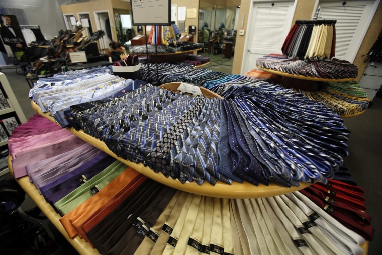 Ties are pictured at a Men's Wearhouse store in Pasadena, Calif. The clothing retailer brushed off a buyout offer from Jos. A. Bank Clothiers.