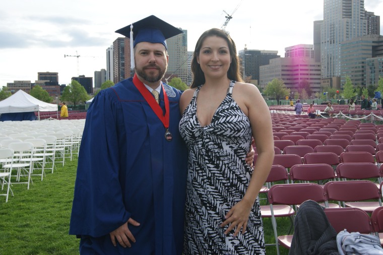 Tony Russell, a Air Force veteran, at his college graduation this May in Denver with his wife, Kimberly, a veteran of the Navy and Air Force. Both were disabled by their service. The couple, with two kids and one on the way, is worried that they will lose their home if VA stops paying benefits Nov. 1 due to the shutdown.