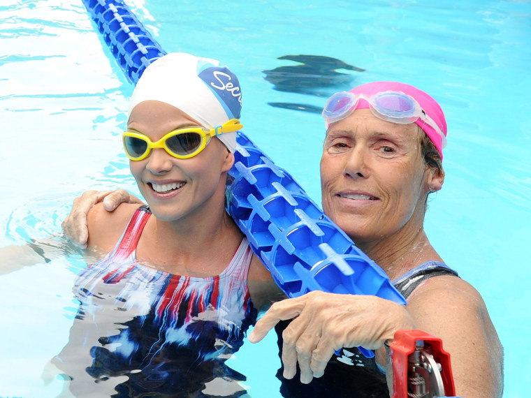 NEW YORK, NY - OCTOBER 09:  Natalie Morales and Diana Nyad swim during \"Swim for Relief\" Benefiting Hurricane Sandy Recovery - Day 2 at Herald Square ...