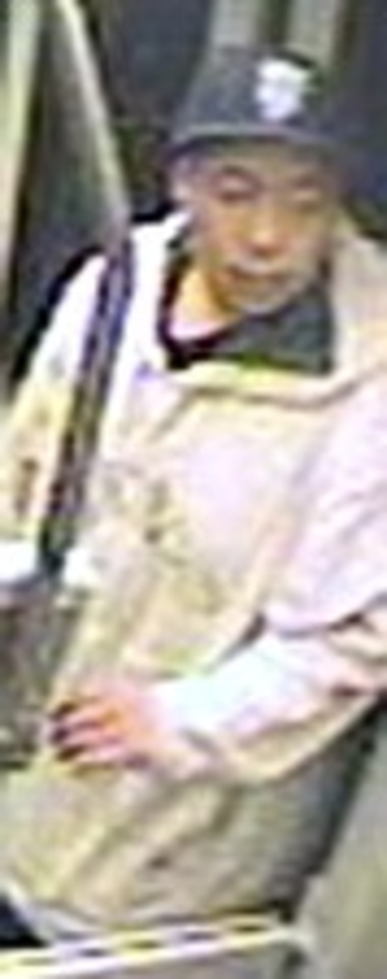 This Sept. 23 image taken from a surveillance video and provided by the San Francisco Police Department show suspect Nikhom Thephakaysone on a MUNI train in San Francisco.