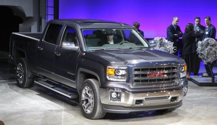 General Motors is recalling 2014 GMC Sierra full-size pickups, like the one shown here, and Chevrolet Silverados because of seats that could fail in a crash.