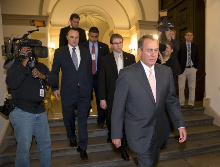 House Speaker John Boehner of Ohio departs the Capitol in Washington, Thursday, Oct. 10, 2013, en route to the White House to a meeting with President Barack Obama.