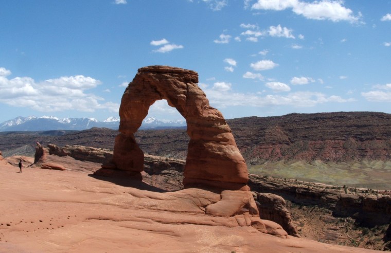 \"Delicate Arch\" in Arches National Park, a short drive from Moab, Utah. The natural sandstone arch is one of the more popular arches, set off from the main road and reachable by a short hike.