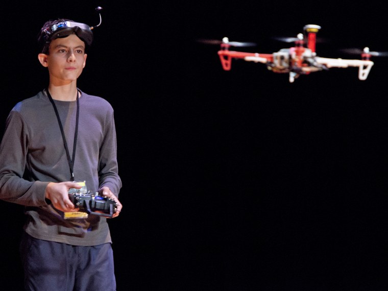 (10/11/2013) Riley Morgan, 14, flies a drone he made at the DARC conference's AfterDARC session in NYU's Skirball Center in New York, N.Y, on Friday,...